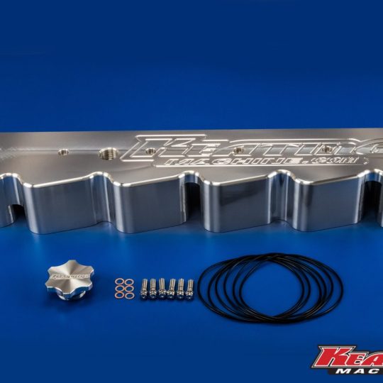 billet aluminum valve cover notched for stock injection lines on Cummins 12 valve engine