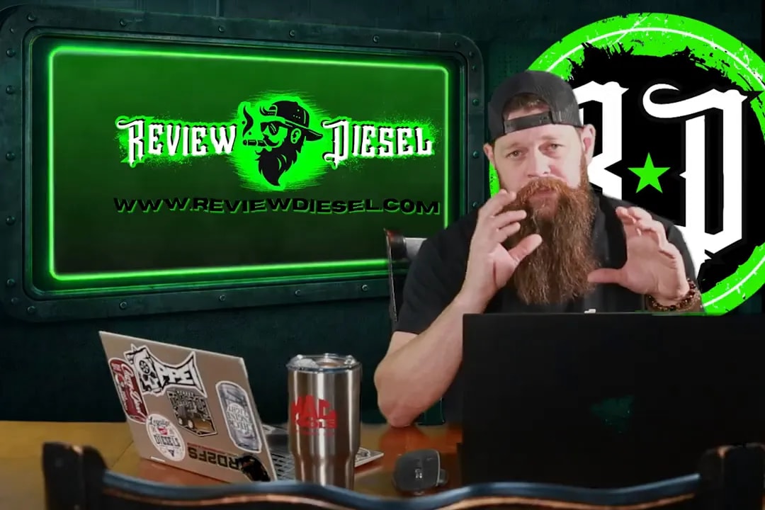 Host explaining EGR cooler failures with Review Diesel logo on the studio screen