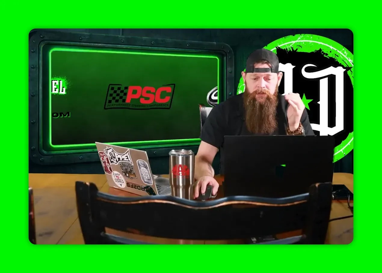 Presenter at desk with green screen showing PSC logo, discussing high-pressure oil system and STC fitting leaks